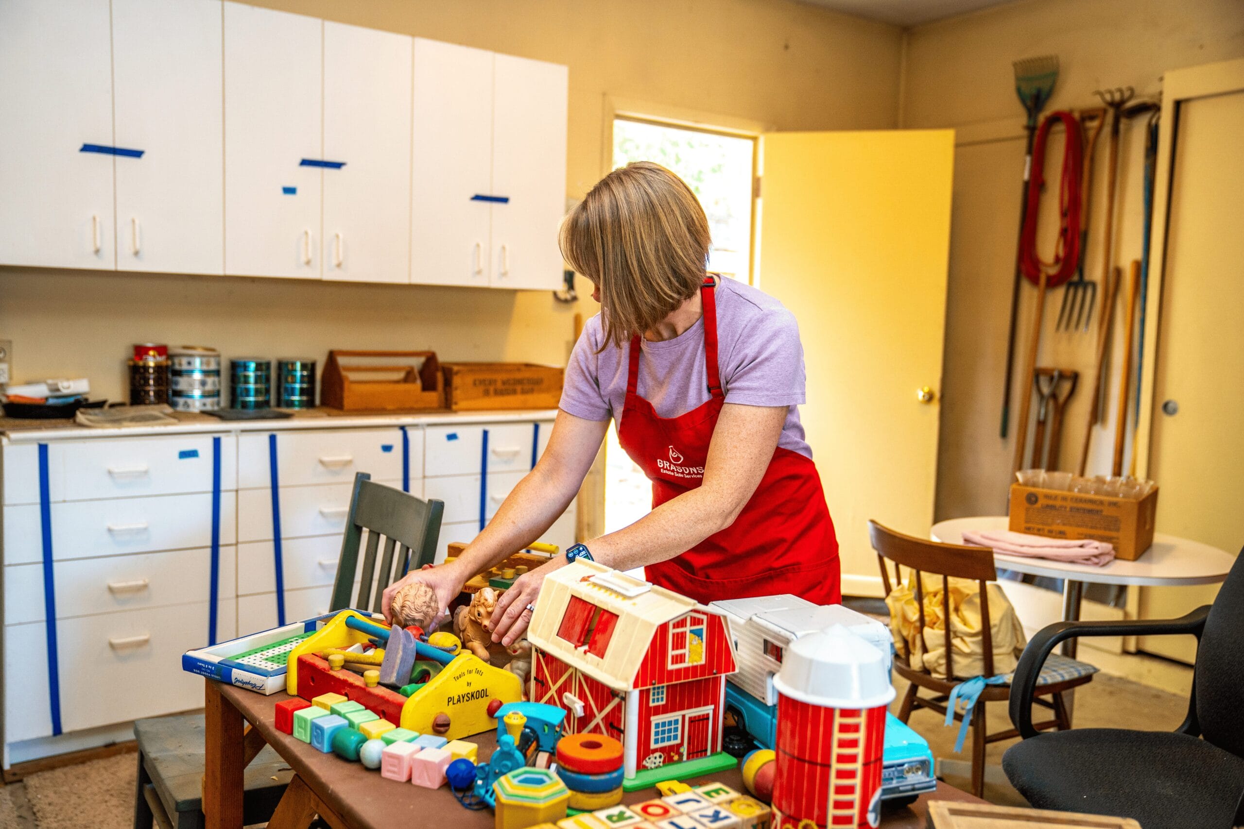 Grasons employee staging an estate sale.